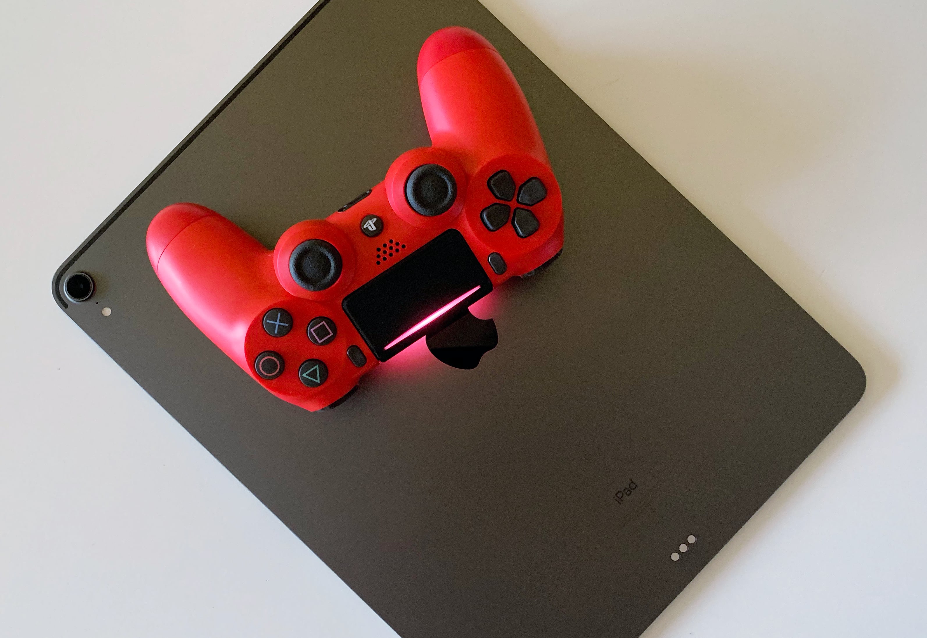 Pasangkan pengontrol PlayStation iPad