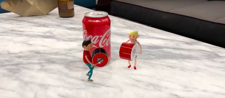 Coca-Cola menggunakan augmented reality untuk iklannya