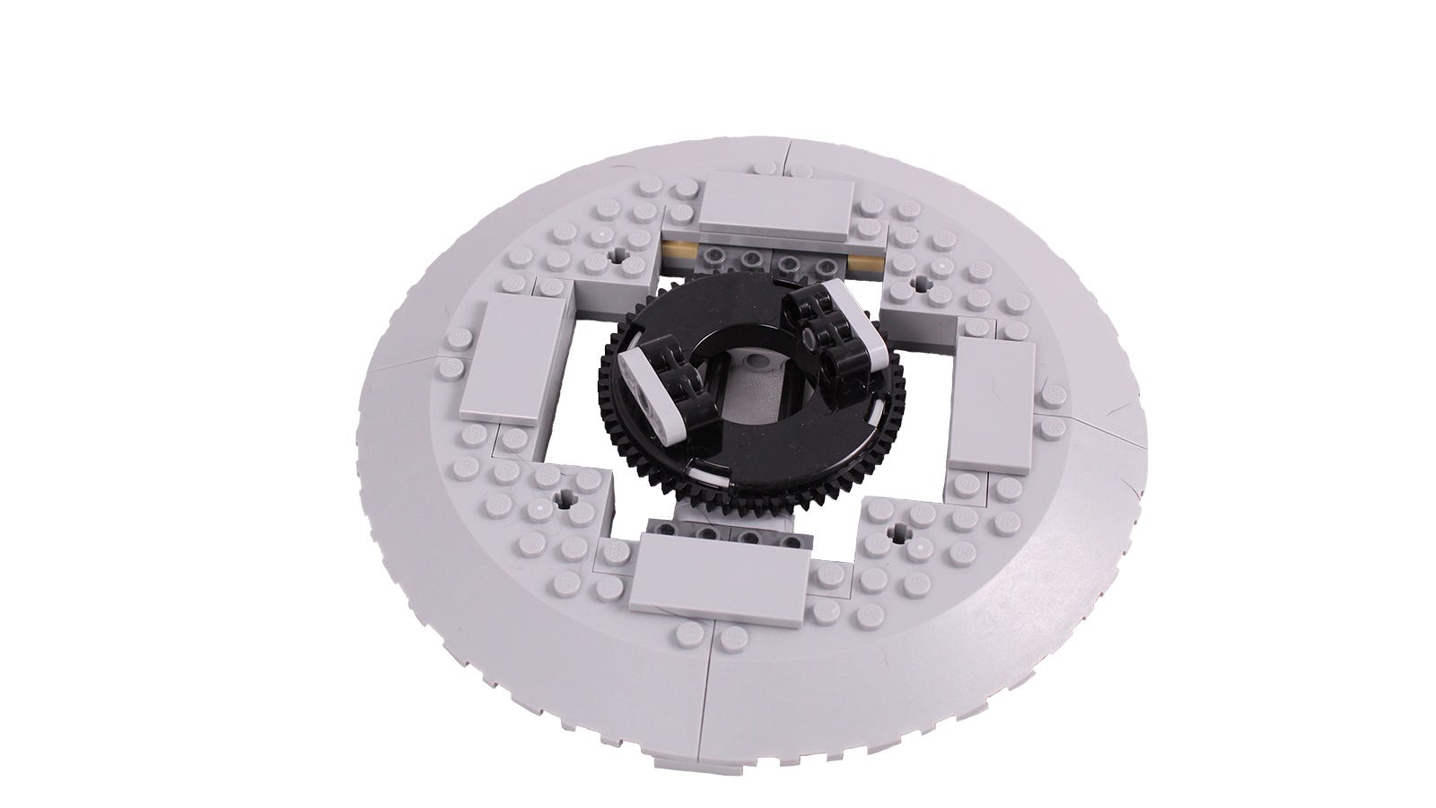 Tampilan jarak dekat dari mekanisme meja putar LEGO.