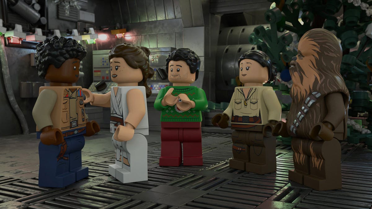 Rey, Finn, Poe, Rose, dan Chewbacca dalam bentuk LEGO selama obrolan.