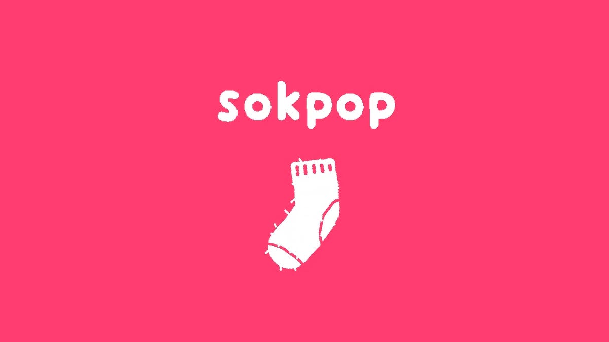Logo Kolektif Sokpop dengan latar belakang merah muda