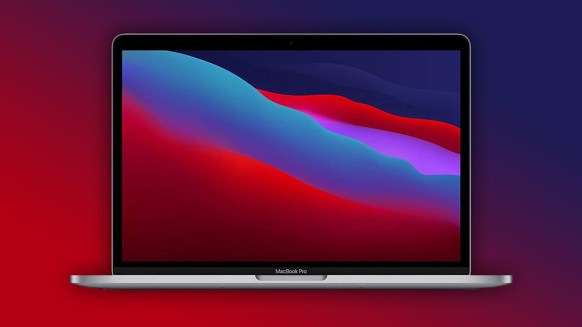MacBook Pro på röd och blå bakgrund.