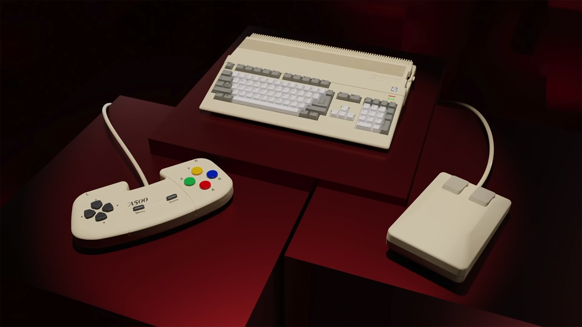 Trò chơi cổ điển THEA 500 trên bàn màu đỏ cùng với trò chơi tái tạo 2-bút chuột và gamepad Amiga CD32.
