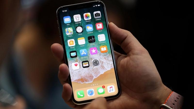 Apple launched a program that offered customers with possibly defective iPhone 8 models with a free repair for their logic board. (Photo: AFP)