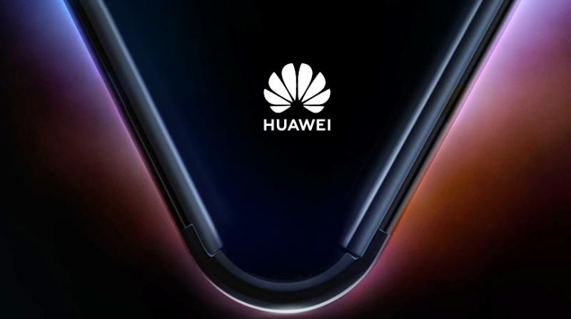 Huawei has been teasing out the new phone to the media and the teaser picture clearly shows off the folding phone in person.