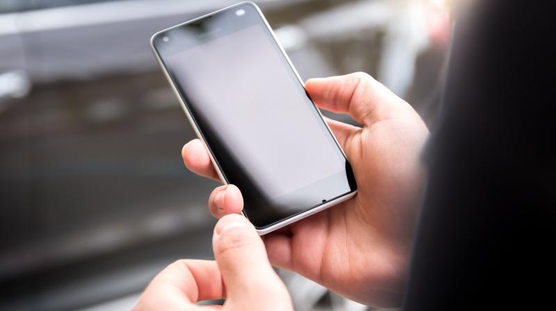 City Councilor Janet Brekke said this week that she plans to propose new restrictions on the use of all handheld electronics while behind the wheel in the coming months. (Representative Image)