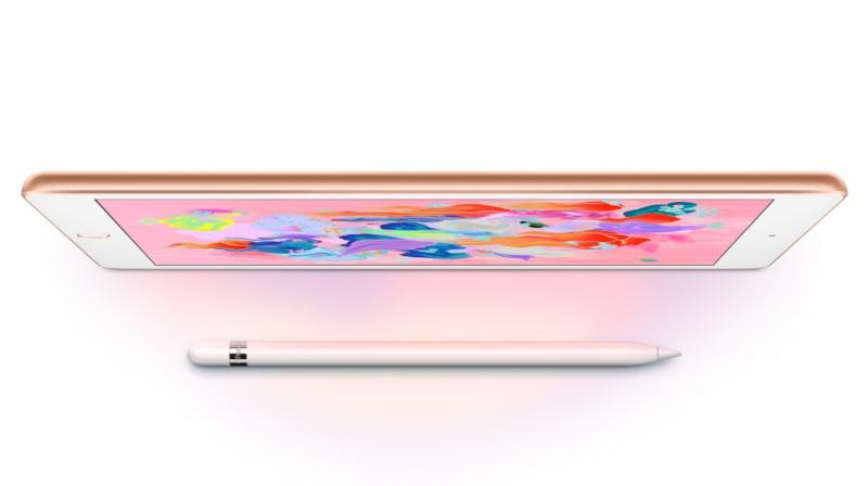 Apple's new 9.7-inch iPad with its Pencil stylus.