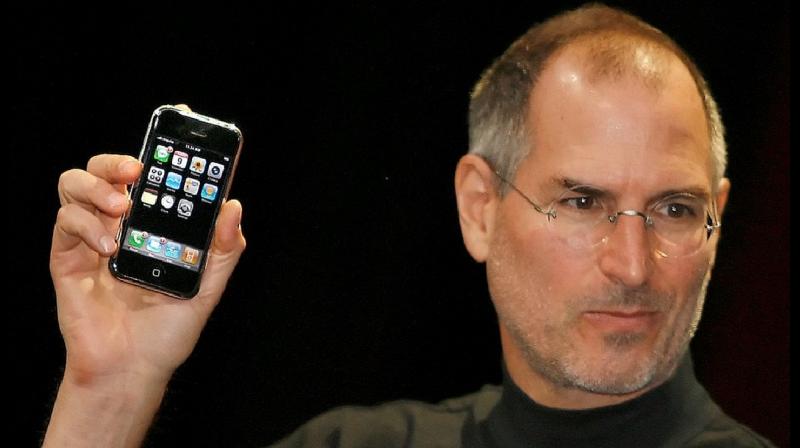 2007: Apple CEO Steve Jobs unveiling the first iPhone, the iPhone 2G.