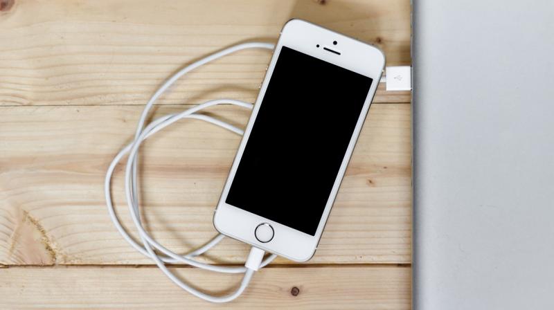 iPhone plugged in on charge (Photo: Pixabay)