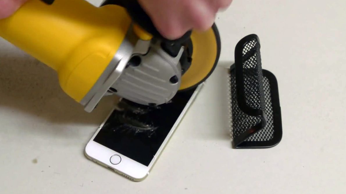 An iPhone 6 under the grinder (YouTube grab)