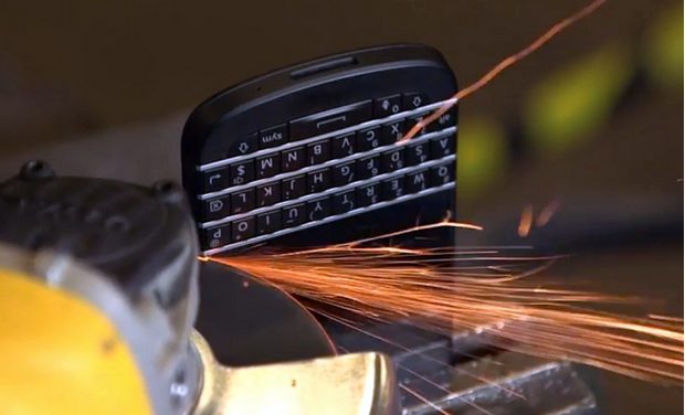A BlackBerry smartphone being destroyed. (Image: video grab)