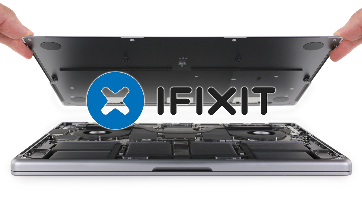 MacBook Pro 14 inci terbuka (model 2021) dengan logo iFixit.