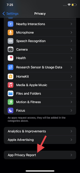 Akses pengaturan Pelaporan Privasi Aplikasi di iOS 15
