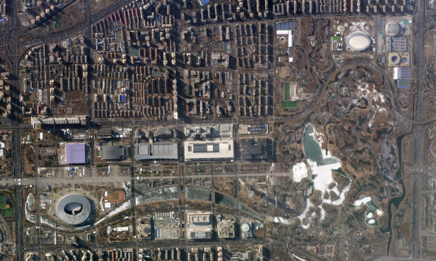 Olympiska spelen 2022 observerade via satellit: Peking i centrum för debatten