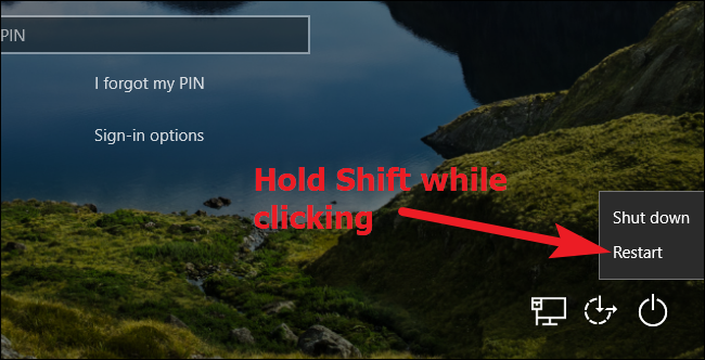 Giữ phím Shift trong khi nhấp vào Khởi động lại trên hệ thống Windows 10